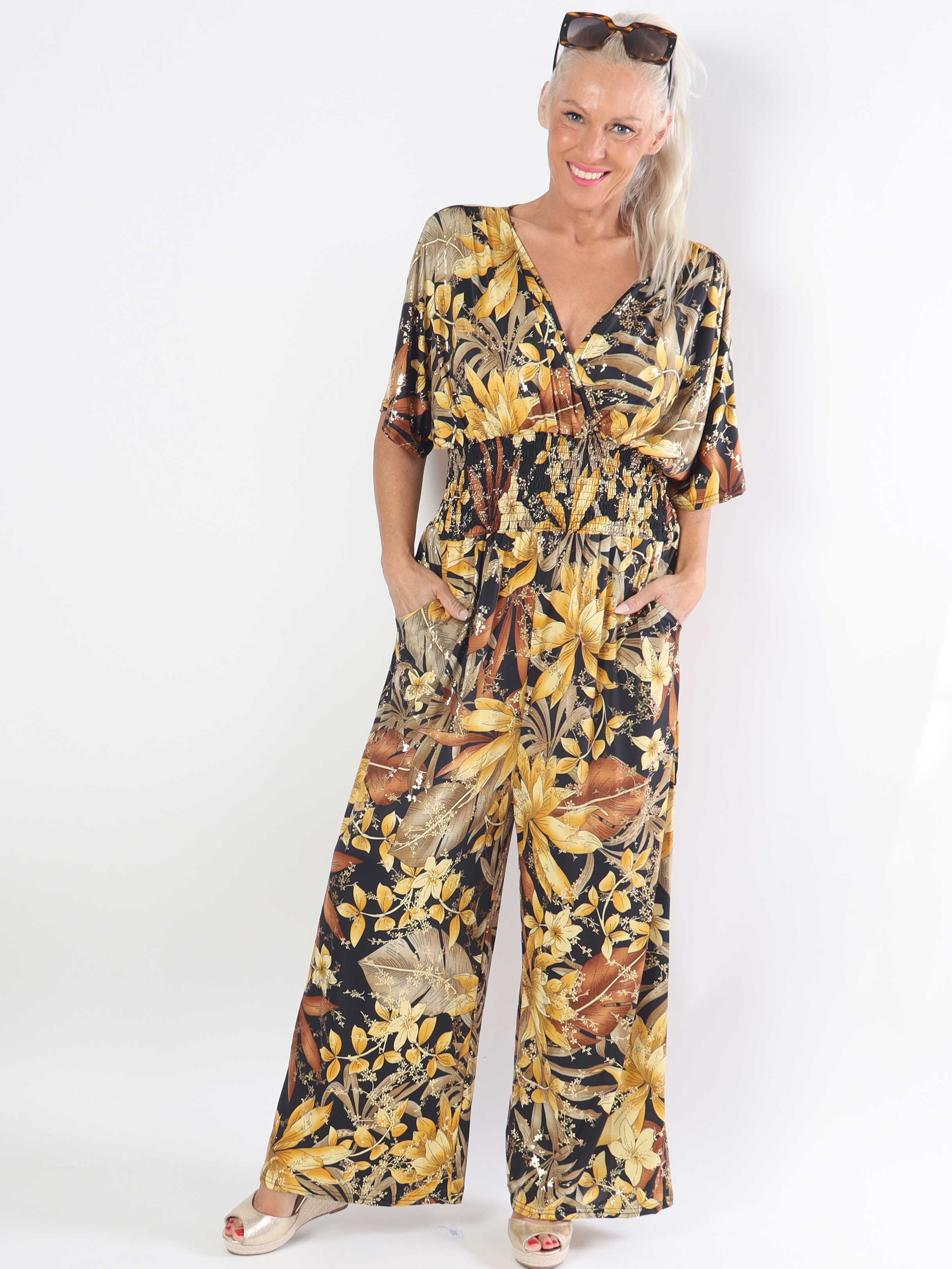 Pams Jumpsuit - Elastisk plus size buksedragt med bladmønster